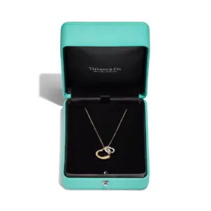 Open Heart Pendant in Yellow Gold and Sterling Silver