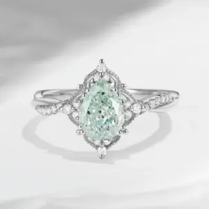 Vintage Style Pear Shaped Lab Green Diamond Infinity Engagement Ring
