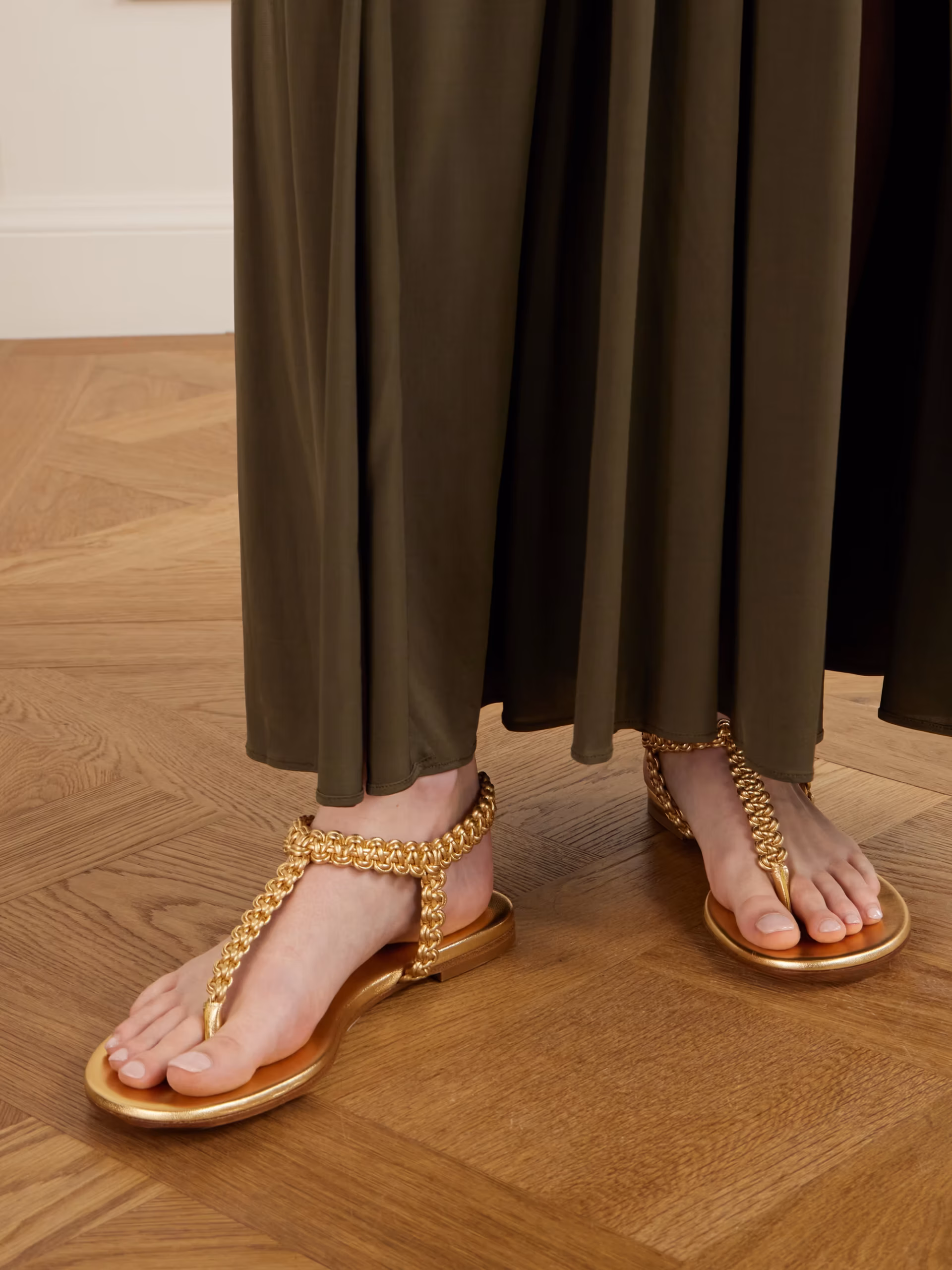 Woven metallic leather thong sandals